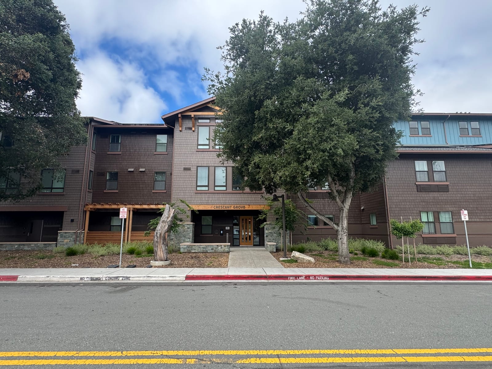 Crescent Grove, a four-story multi-family development on Ruby Street in Alameda County, CA.
